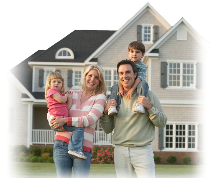 White family standing in front of home.